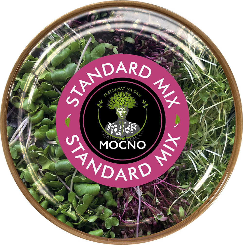 Čist kadar poklopca Standard Mix pakovanja odozgo. U fokusu je ružičasti dizajn etikete sa MOĆNO logotipom i nazivom mešavine koja predstavlja bazu svakog zdravog obroka.